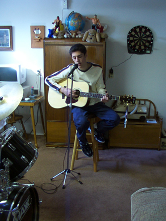 Jim on acoustic guitar.
