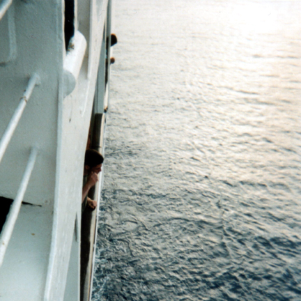 Jim looking off a cruise ship.